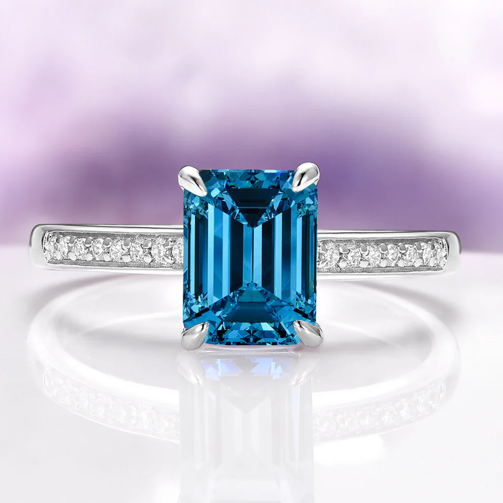 Emerald Cut Natural London Blue Topaz Ring in Sterling Silver